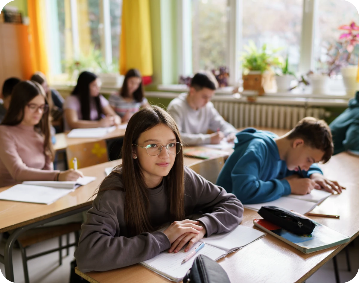 Students in a classroom taking notes.