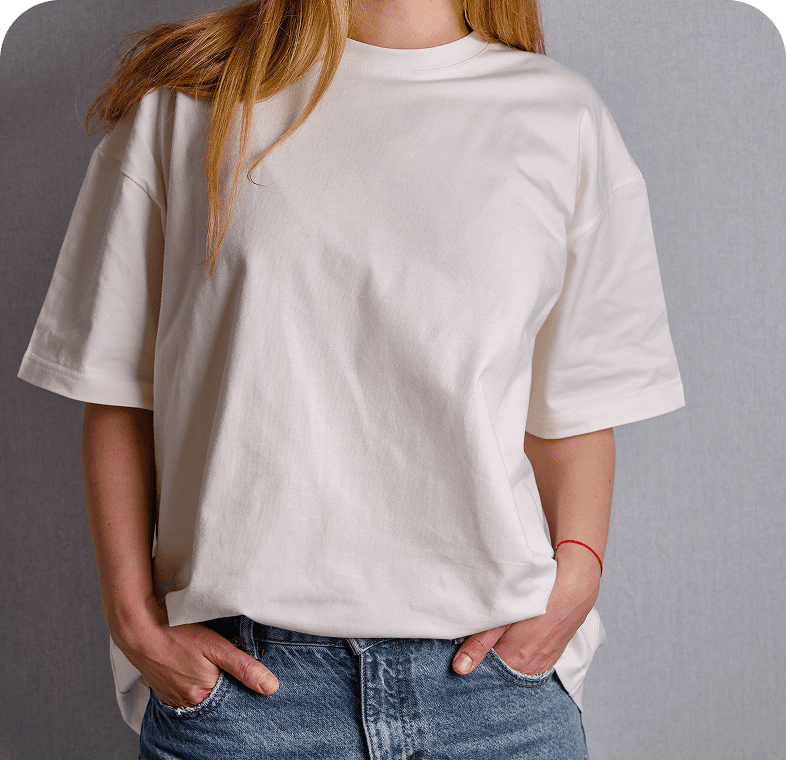 Person wearing white t-shirt and jeans.