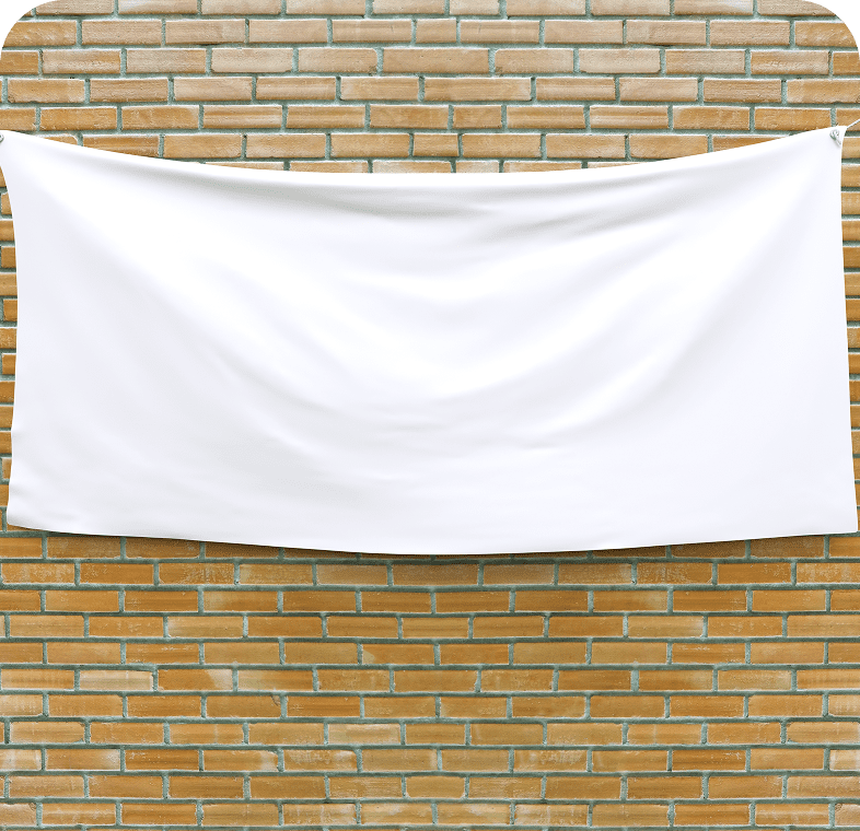 White cloth hanging on a brick wall.