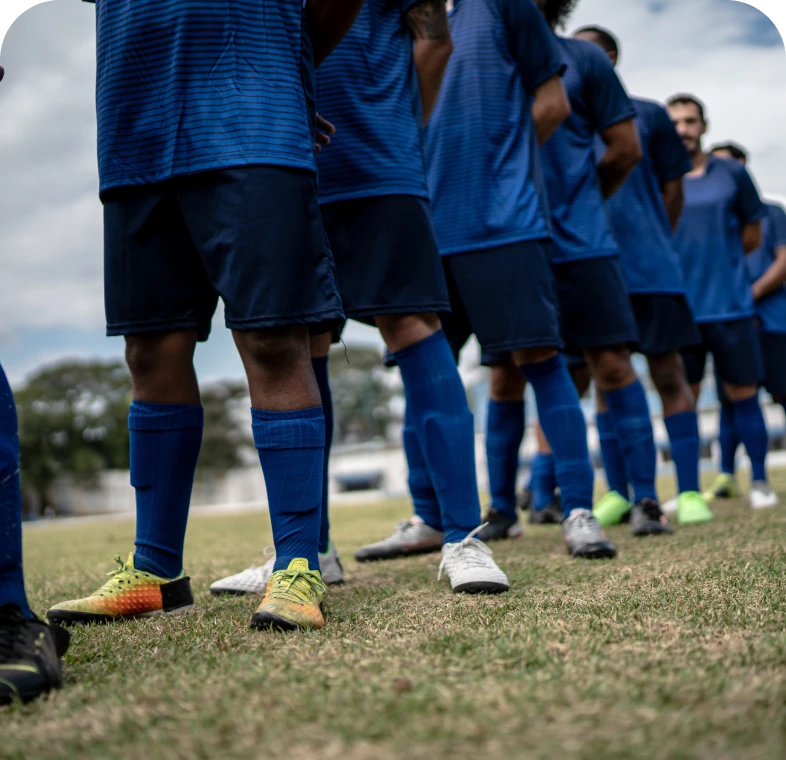 Soccer team standing in a line.